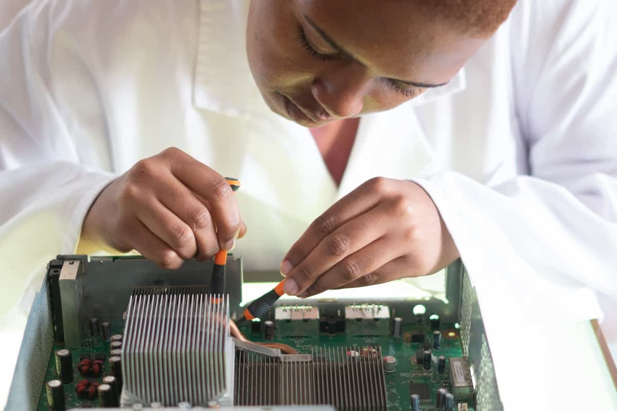 Person repairing a computer graphics card What Is Computer Engineering?