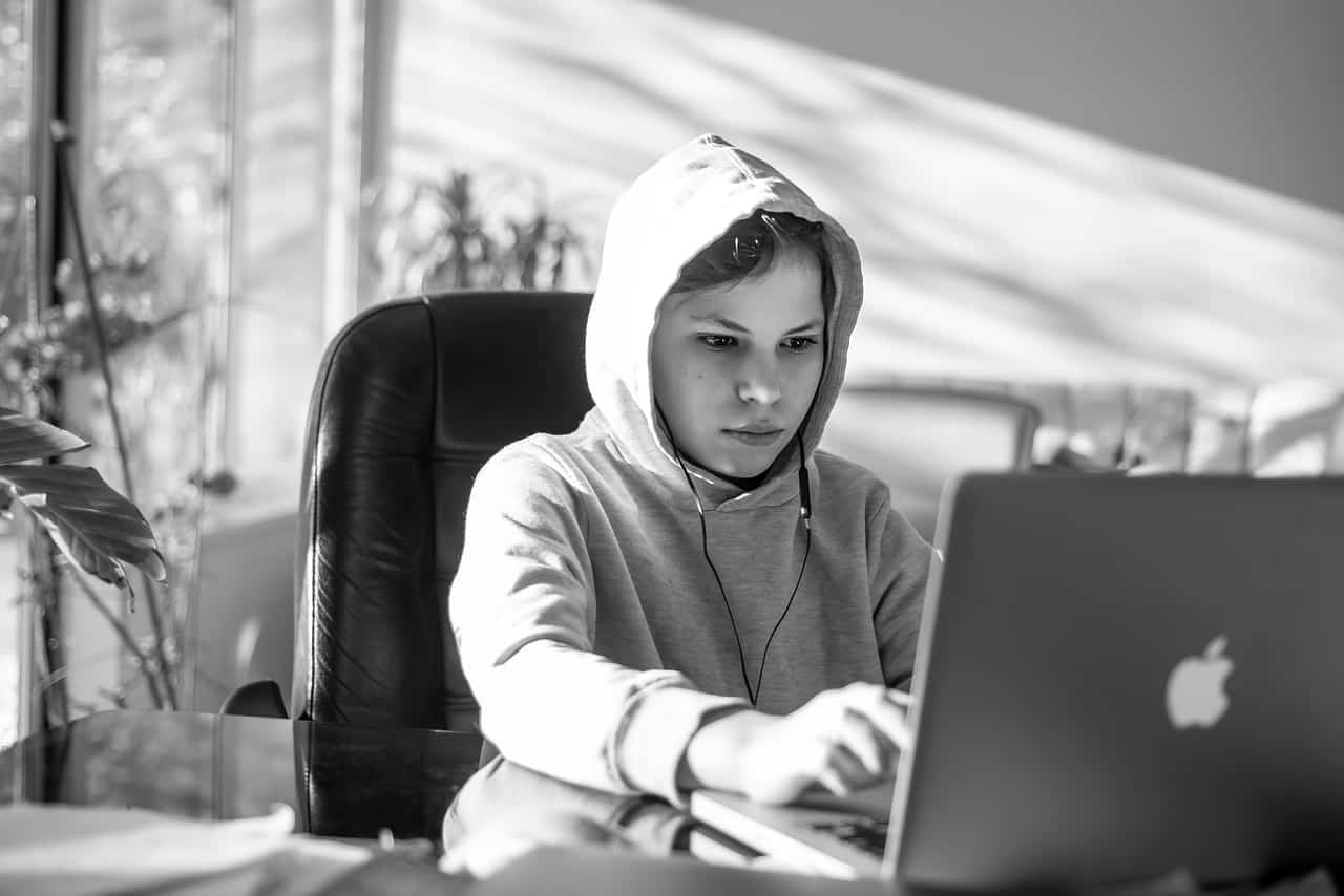 Young boy learning online with a laptop Getting a Job After a Coding Bootcamp