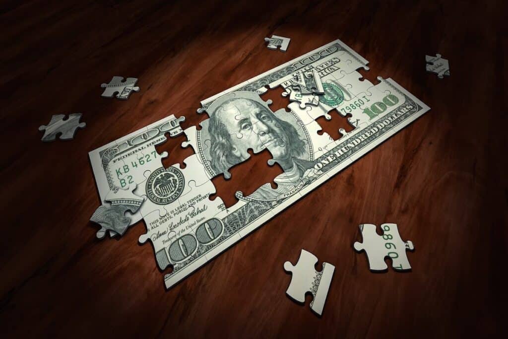 a hundred-dollar-bill jigsaw puzzle what is business analytics