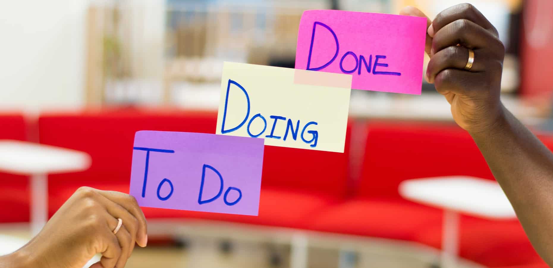 How-to-Become-a-Scrum-Master Two hands holding notes that say “To do”, “Doing”, and “Done”. How to Become a Scrum Master: A Step-by-Step Guide