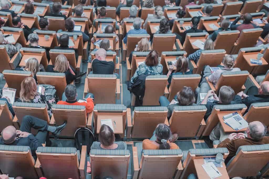 Aerial view of an auditorium-style classroom. LGBTQ+ Coding Bootcamp Scholarships