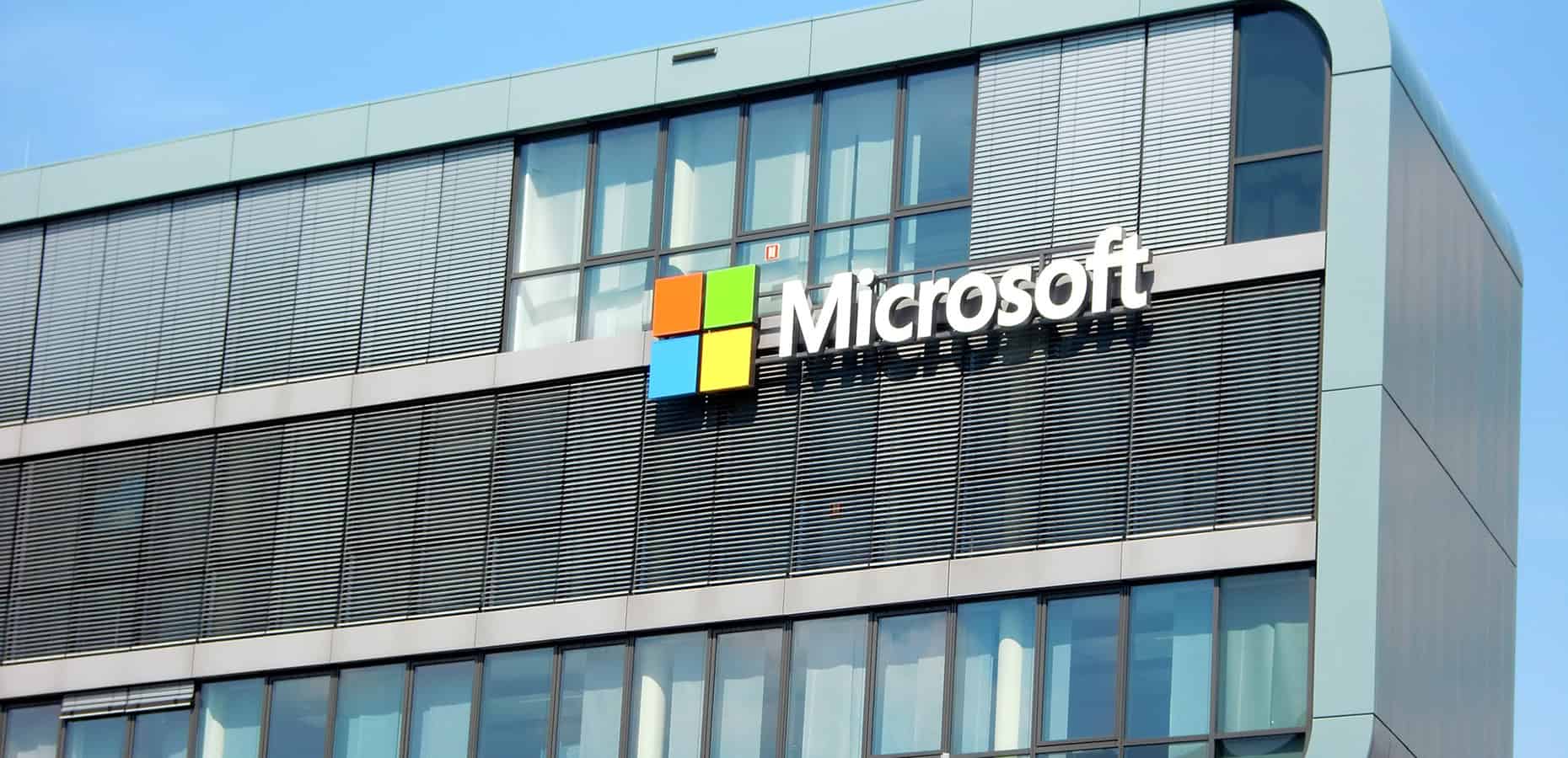 Microsoft-Hiring-Process An office building with the Microsoft logo. Microsoft Hiring Process: Getting a Job at Microsoft